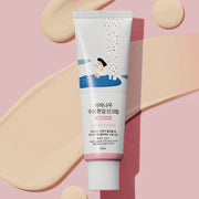 Tube of sunscreen with a design on a pink background