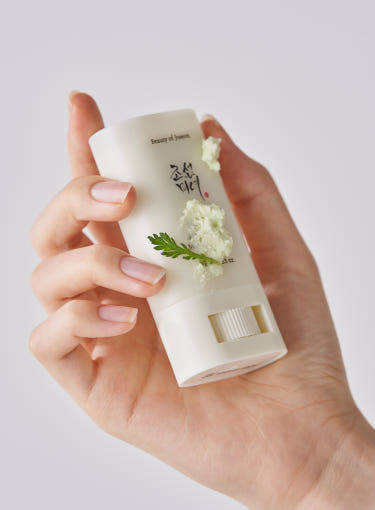 sun stick in hand